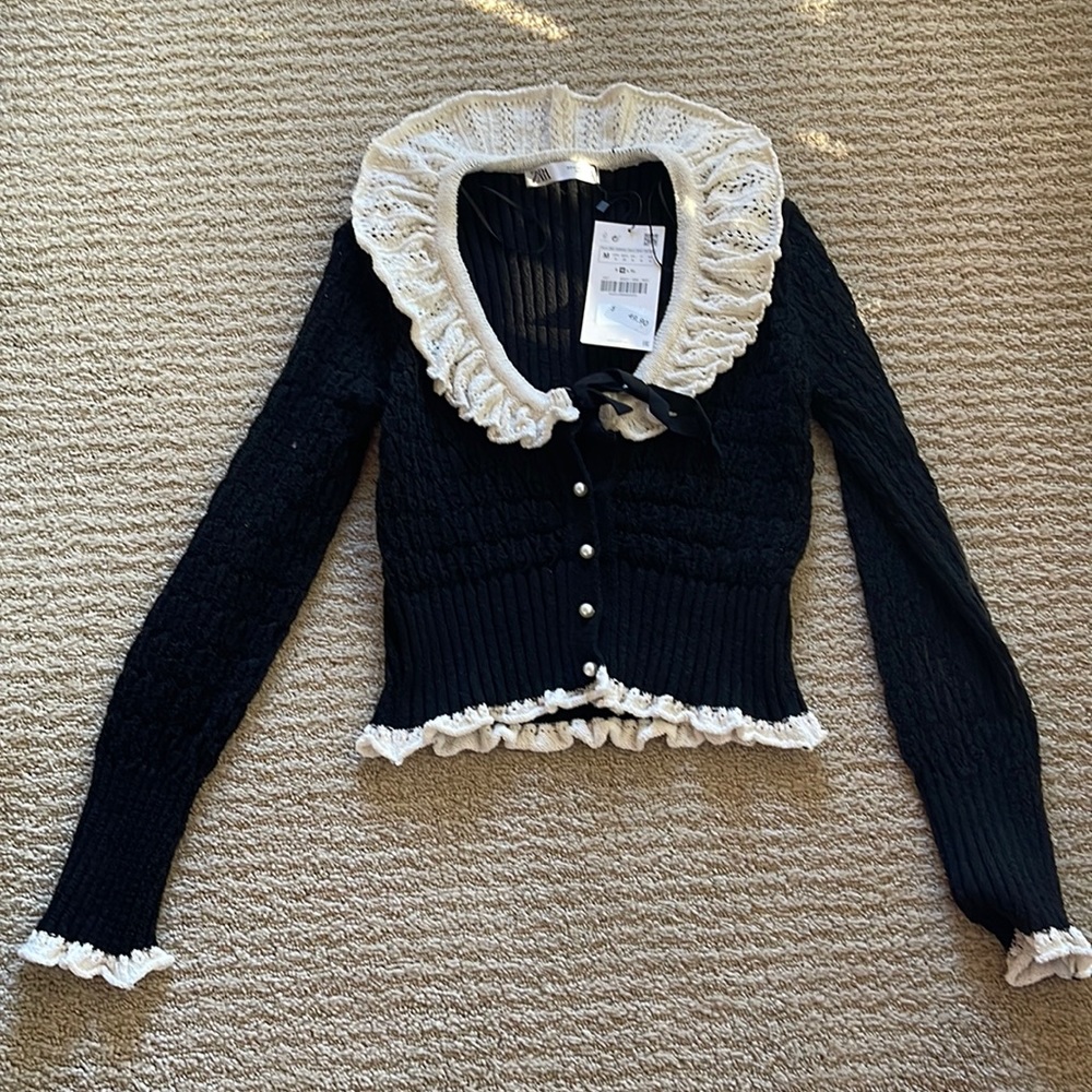 Brand new black and white ruffle Zara cardigan.